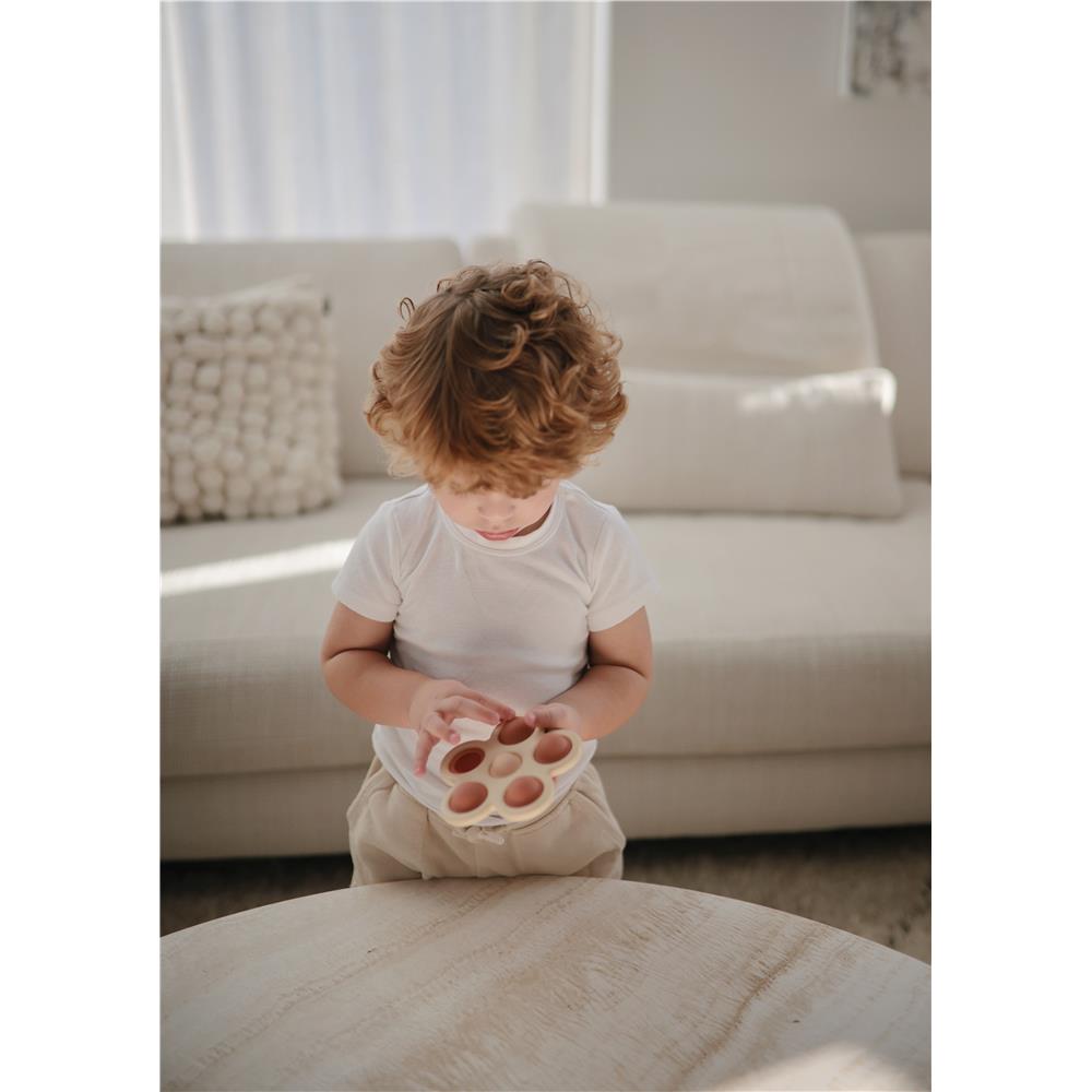 Mushie Sensorik-Spielzeug Blume, Rose, aus Silikon, BPA-frei