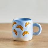 Bloomingville MINI Millie Tasse 110 ml blau - Steingut Kinder Tasse mit Croissantmotiv für Küche
