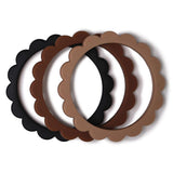 Mushie Beißring Blumen 3er Set, Black/Natural/Caramel, Armband aus Silikon, BPA-frei